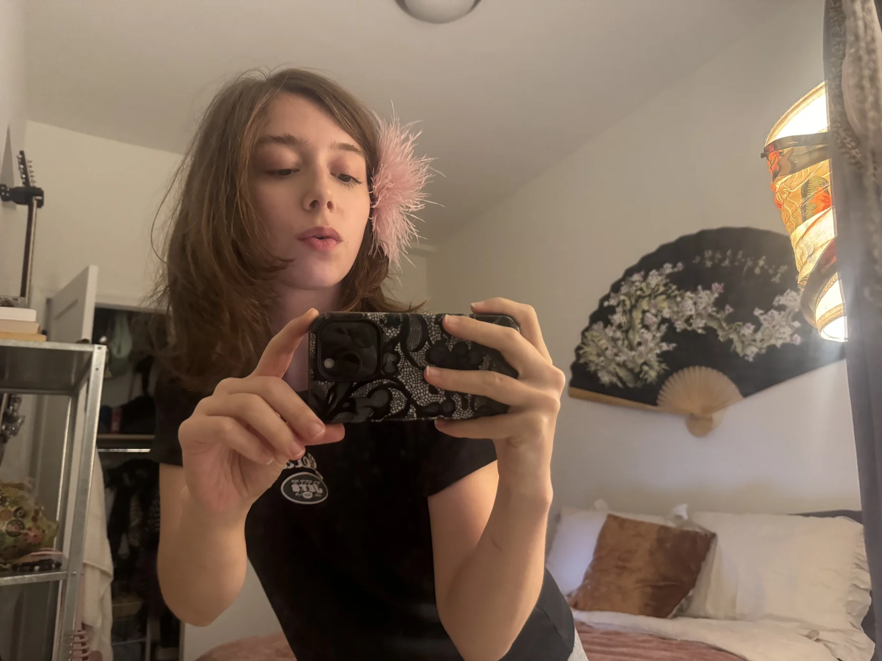 McKenzie Waddell reflected in a mirror while getting ready